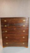 A 19th century mahogany tall chest of five graduating long drawers. 136x114x47cm