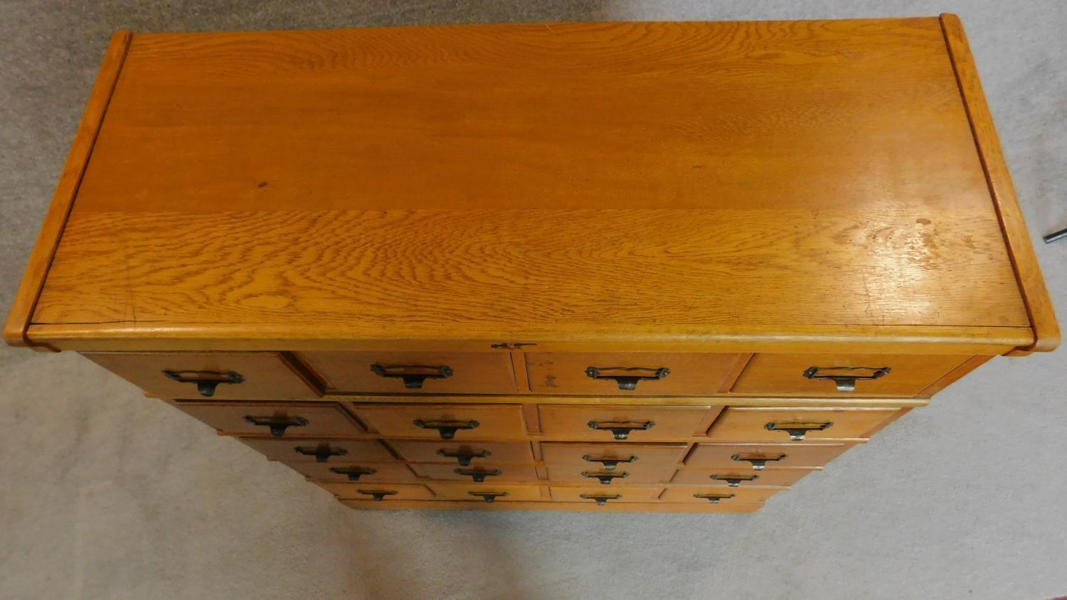 An American oak seven section (including plinth base and top) filing cabinet by Kenrick and - Image 8 of 10