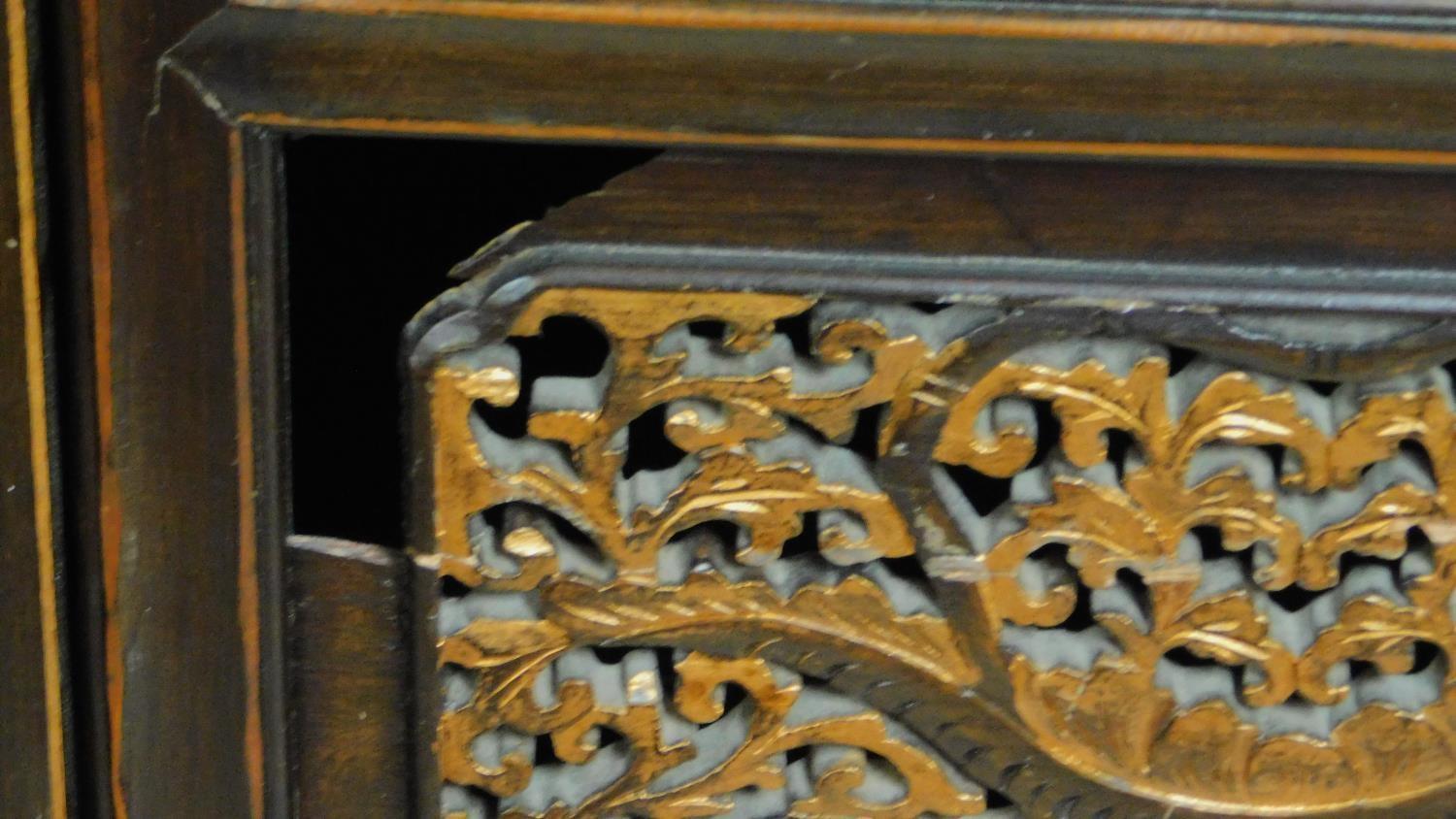 A lacquered and carved Chinese sideboard fitted central cupboard flanked by drawers. 90x180x45cm - Image 9 of 10