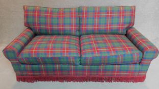 A tartan two seater sofa bed. 77x190x100cm