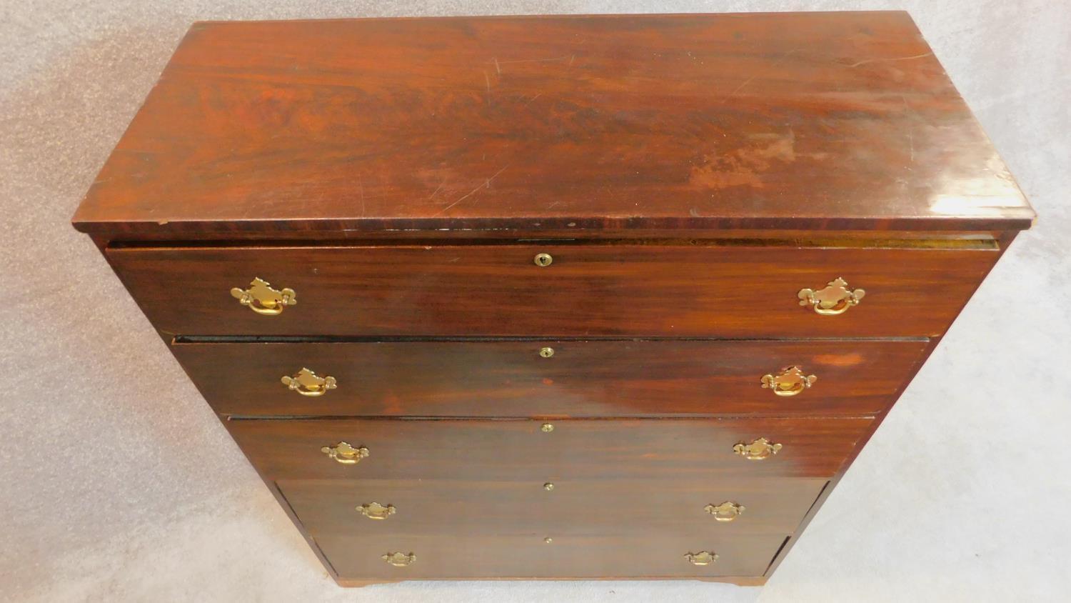 A 19th century mahogany tall chest of five graduating long drawers. 136x114x47cm - Image 5 of 5