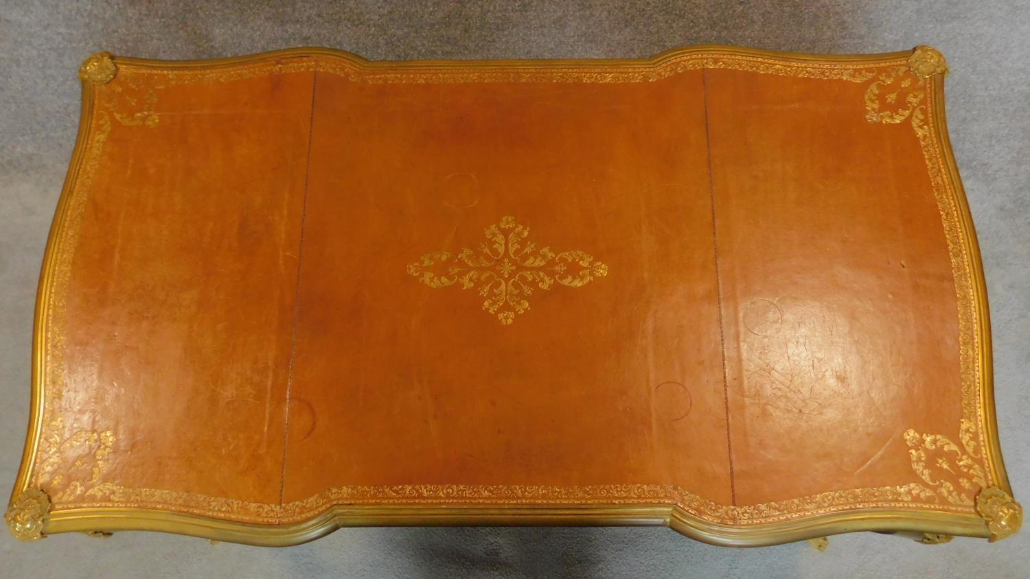 A walnut Louis XV style bureau plat of compact size with shaped tooled leather inset top with ormolu - Image 9 of 12