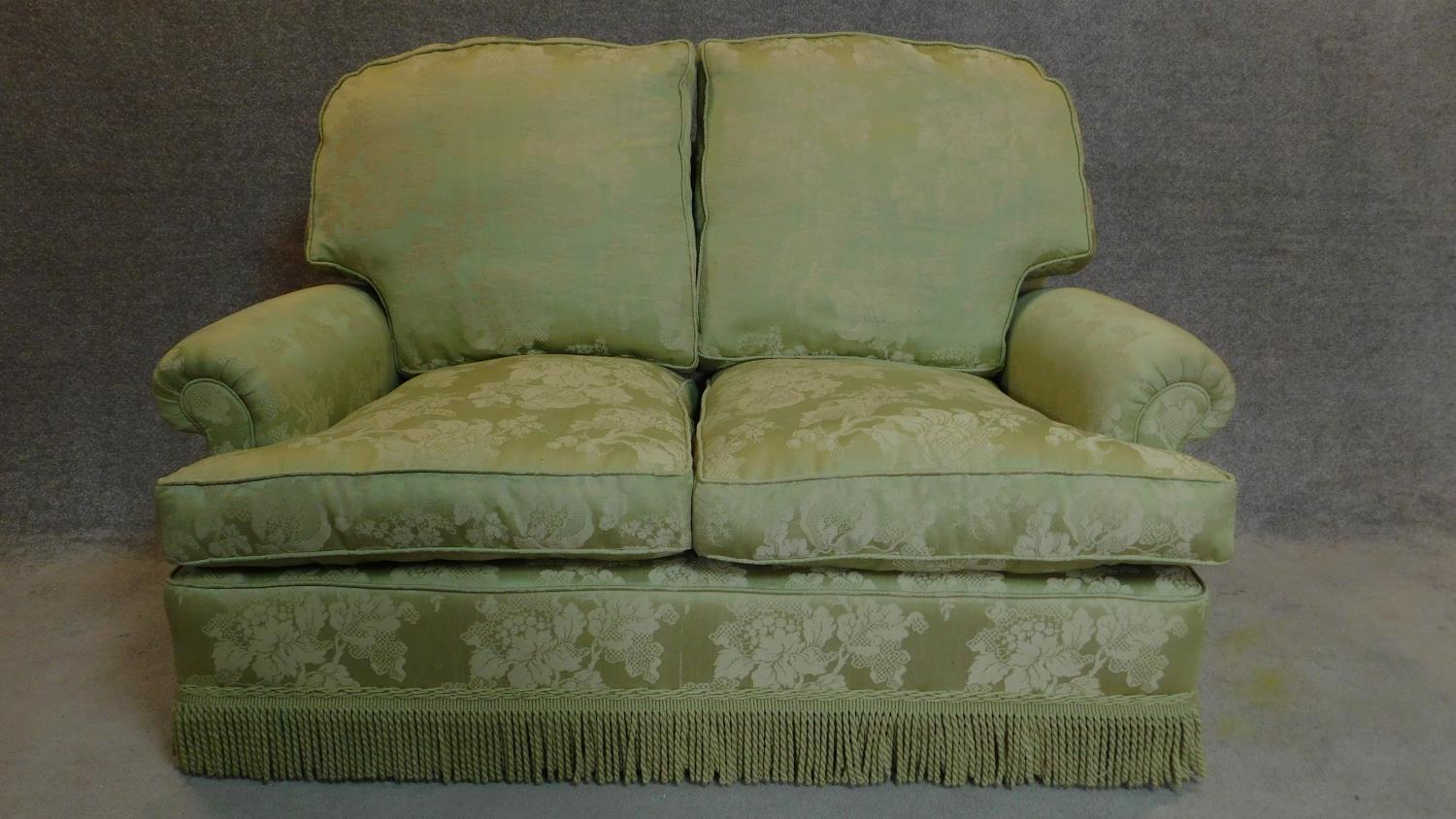 A two seater sofa in floral green upholstery. 97x145x80cm - Image 2 of 5