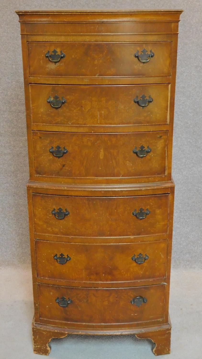 A burr walnut Georgian style chest on chest with makers label. 132x53x42cm