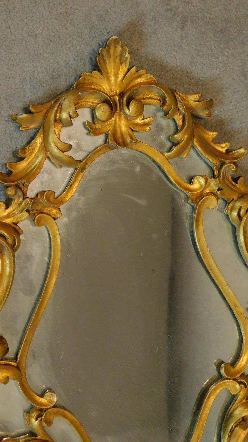 A carved giltwood Florentine style wall mirror. H.71 W.51cm - Image 2 of 3