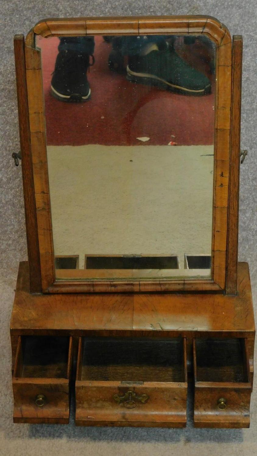 An early Georgian walnut swing mirror fitted drawers to base with original plate. H.56cm - Image 2 of 3