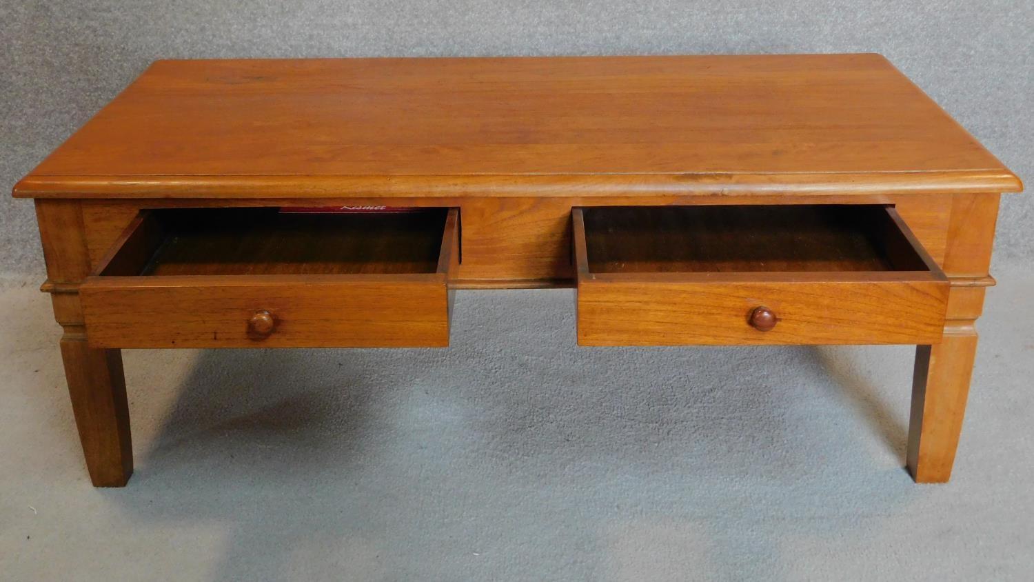 An Eastern teak low table fitted frieze drawers. 46x124x63cm - Image 3 of 5