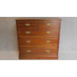 A late Victorian walnut chest of drawers fitted original brass handles on plinth base. 122x121x50cm