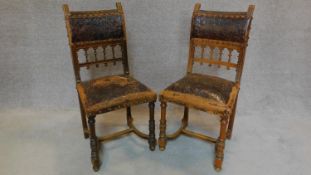 A pair French carved oak dining chairs. H.95cm
