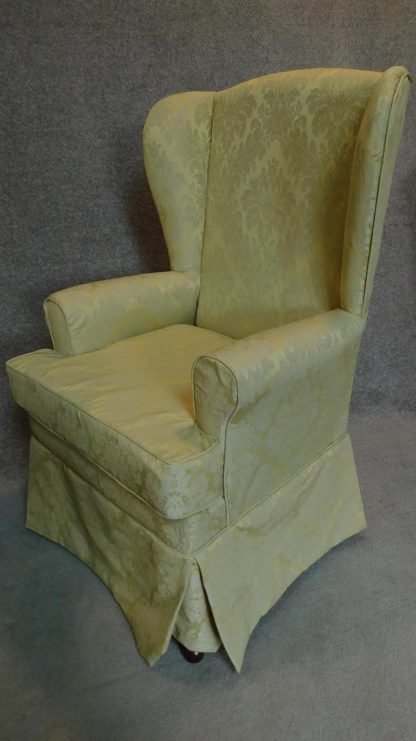 A pair of wing armchairs in floral lemon upholstery. H.107cm - Image 2 of 3