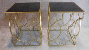 A pair of gilt metal framed low tables with glass tops. 50x38cm