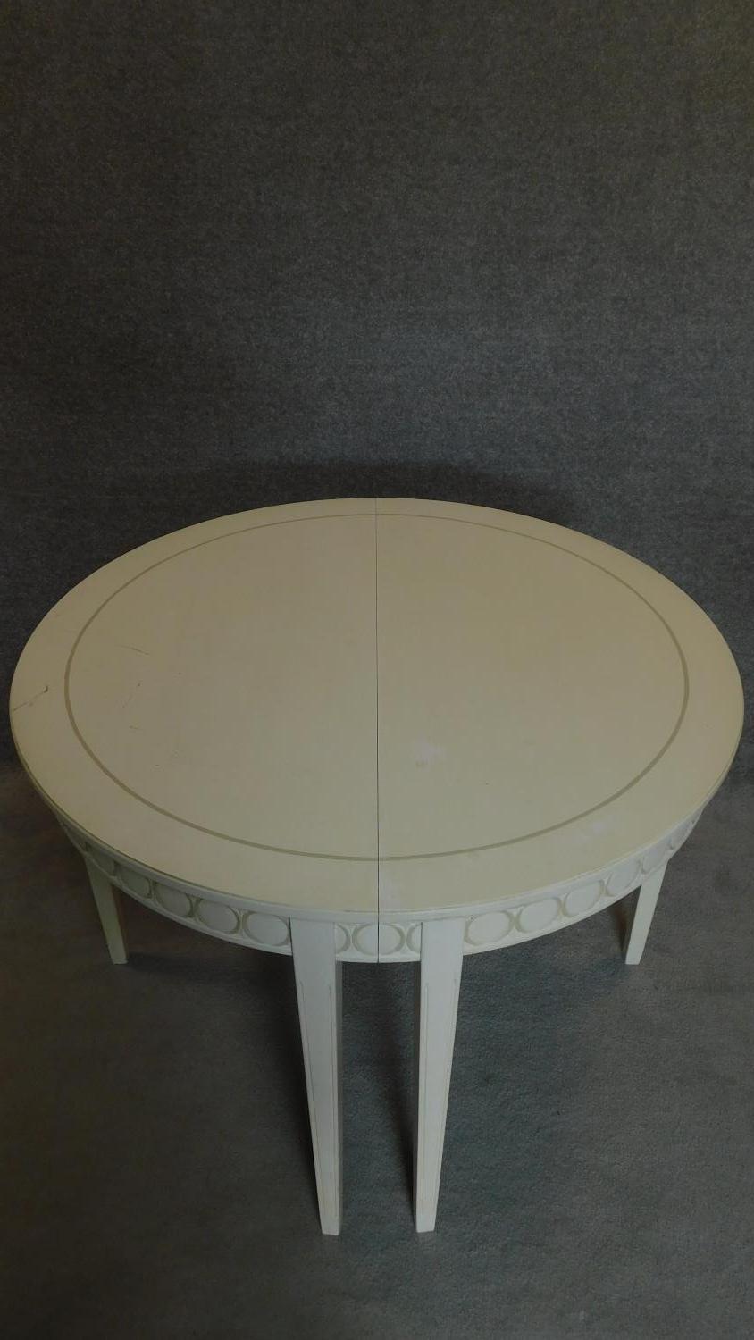 A white painted and decorated Georgian style extending dining table with three extra leaves, - Image 3 of 7