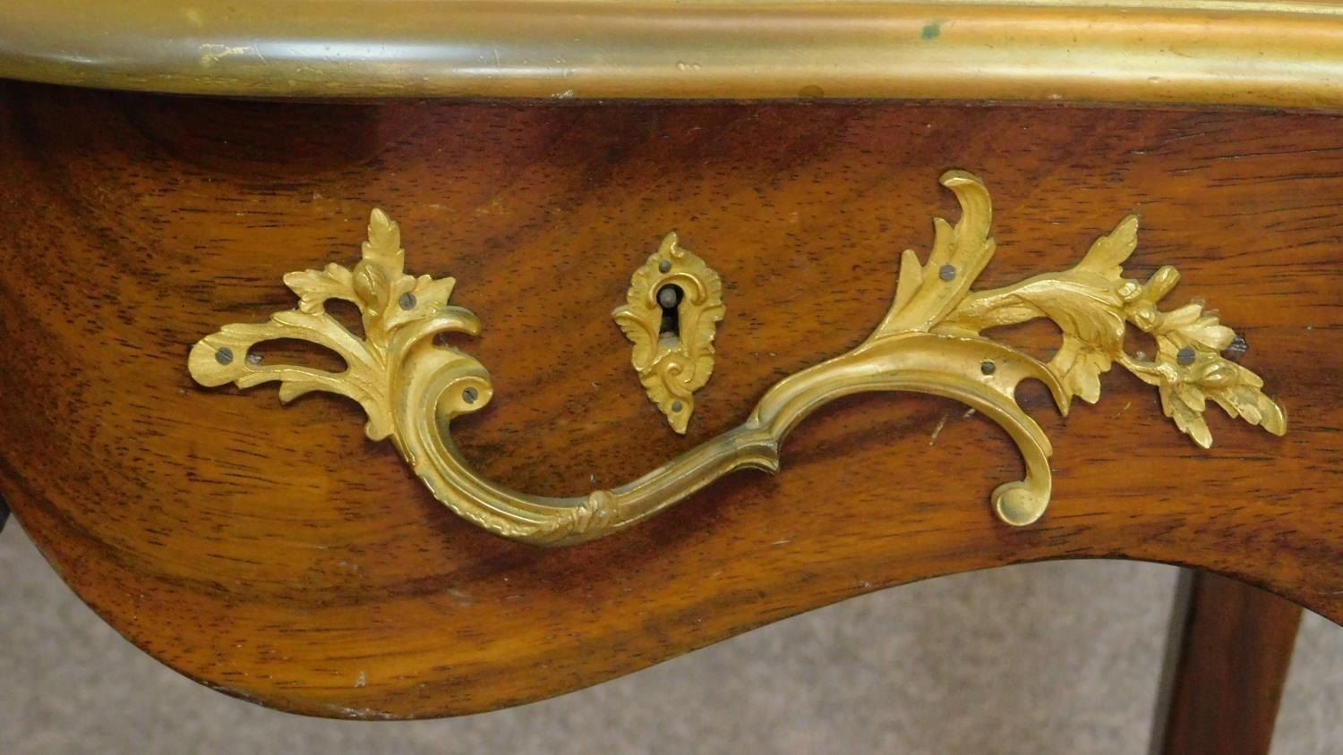A walnut Louis XV style bureau plat of compact size with shaped tooled leather inset top with ormolu - Image 4 of 12