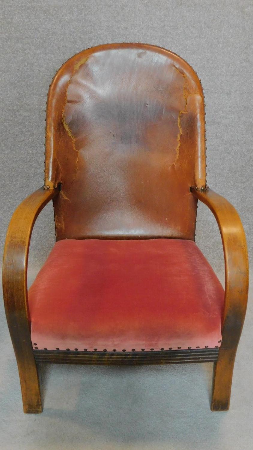 A pair of mid 20th century leather backed armchairs. H.92cm - Image 2 of 5