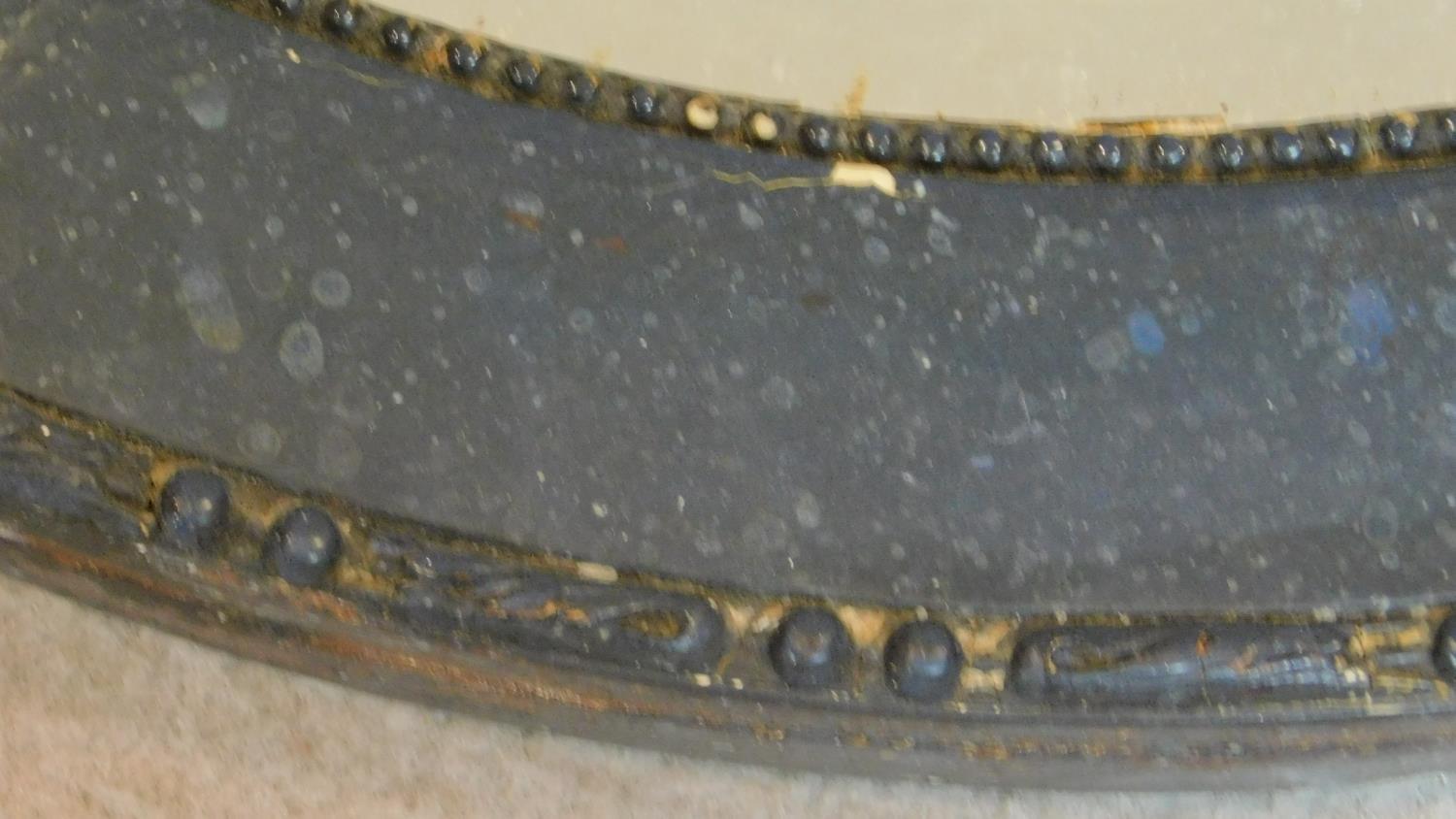 A 19th century gilt framed wall mirror with bevelled plate, another similar and an oval mirror. - Image 3 of 4