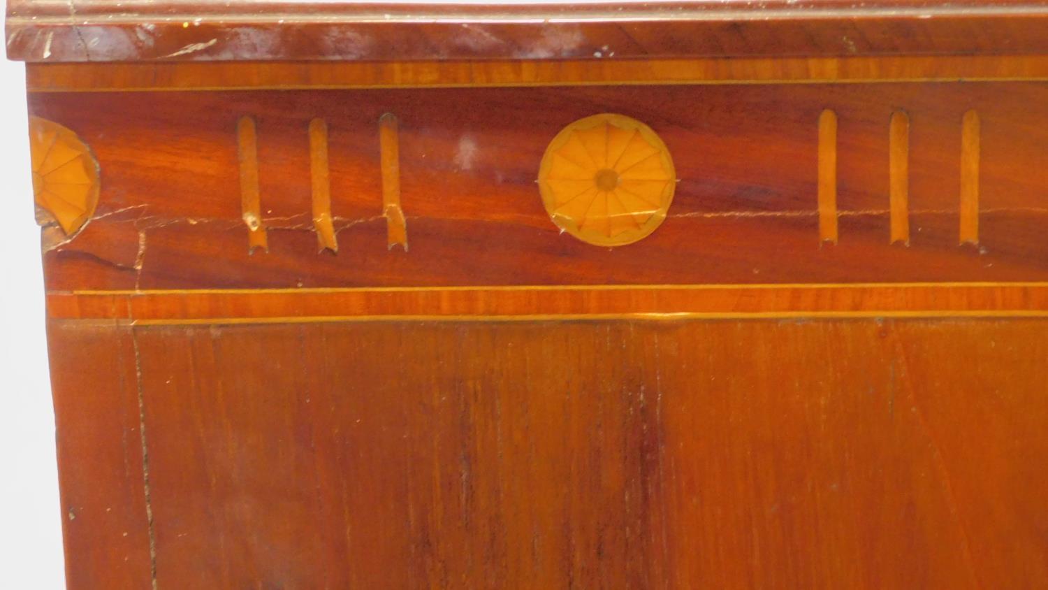 A Georgian mahogany and satinwood inlaid bowfront chest of two short over three long drawers. H. - Image 7 of 7