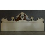 An ornate floral inlaid and painted large sized headboard. 100x227cm