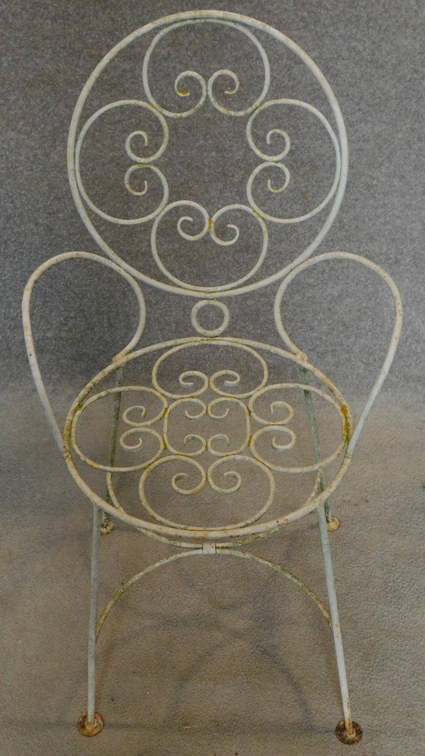 A set of four wrought iron and painted garden chairs. H.87cm - Image 3 of 3