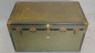 A vintage brass and leather bound hinged cabin trunk. H.49 W.91 D.51cm