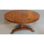A Victorian mahogany circular tilt top dining table on tripod pedestal base. H.73 W.133cm