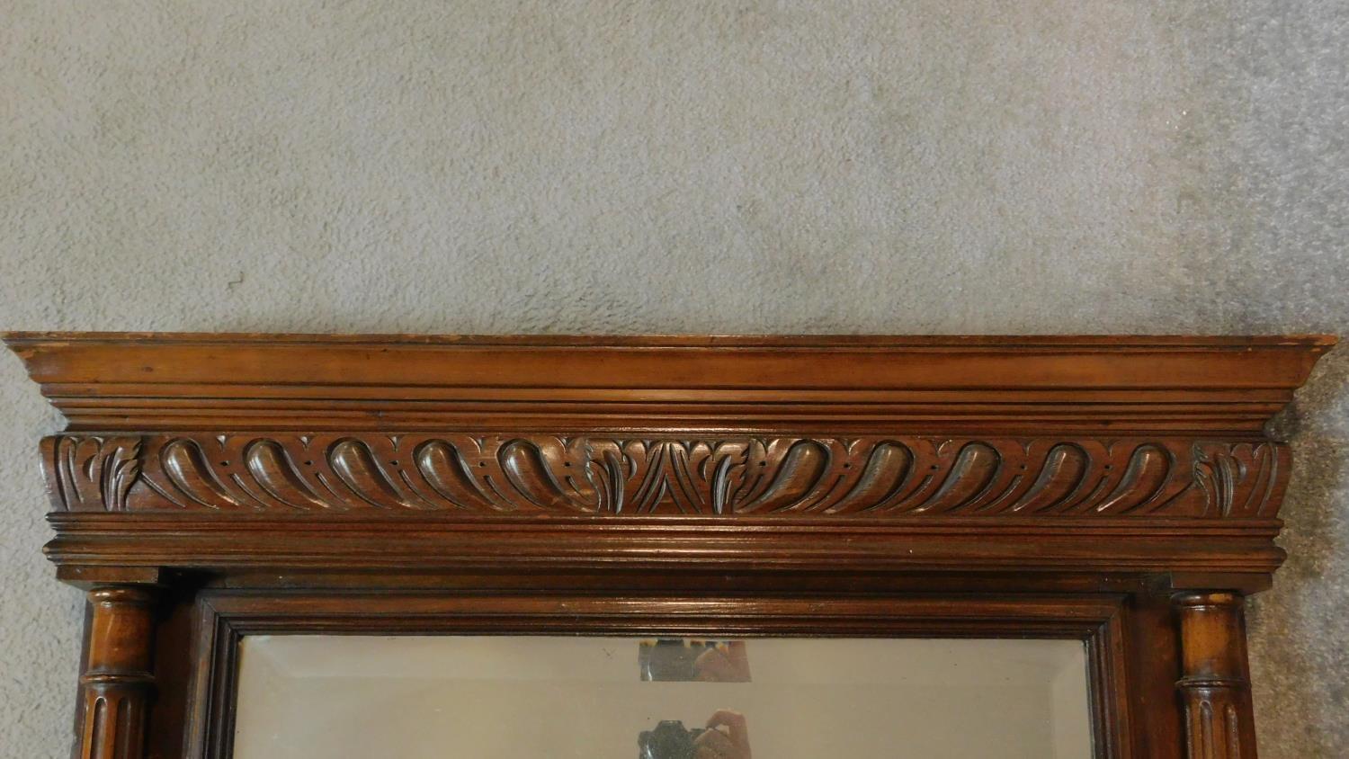 A late 19th century Continental carved walnut overmantel mirror fitted bevelled plate. 114x89cm - Image 2 of 5