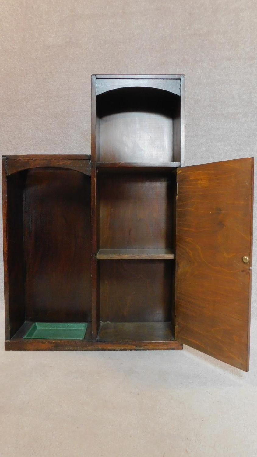 A mid 20th century oak hall cabinet fitted umbrella stand and drip tray. H.93 W.61 D.8cm - Image 2 of 5