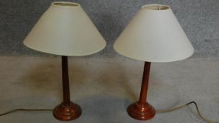 A pair of lacquered metal table lamps H.50cm
