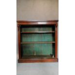 A Victorian walnut open bookcase on plinth base. H.108 W.105 D.29cm