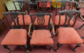 A set of six 19th century mahogany carved Chippendale style dining chairs to include one elbow