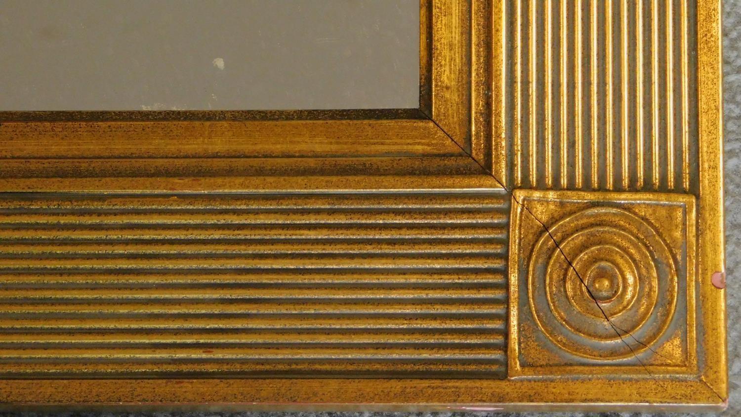 A rectangular gilt and reeded framed pier mirror. 109x79cm - Image 2 of 3