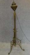 A 19th century brass floor standing oil lamp converted to electricity. H.140cm