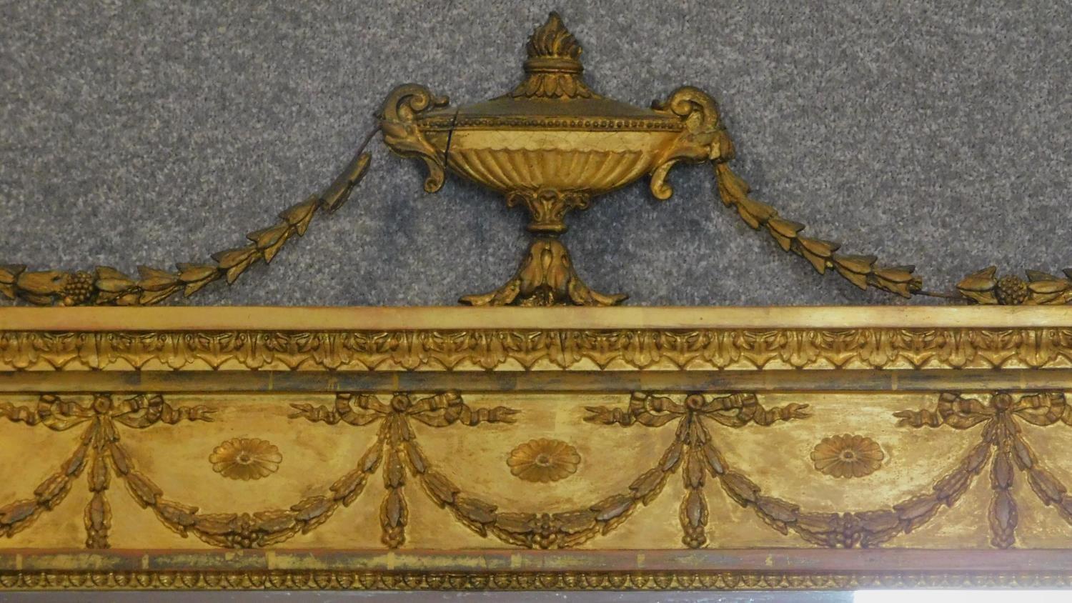 A 19th century Adam style giltwood overmantel mirror with swag and urn surmount and original - Image 2 of 5
