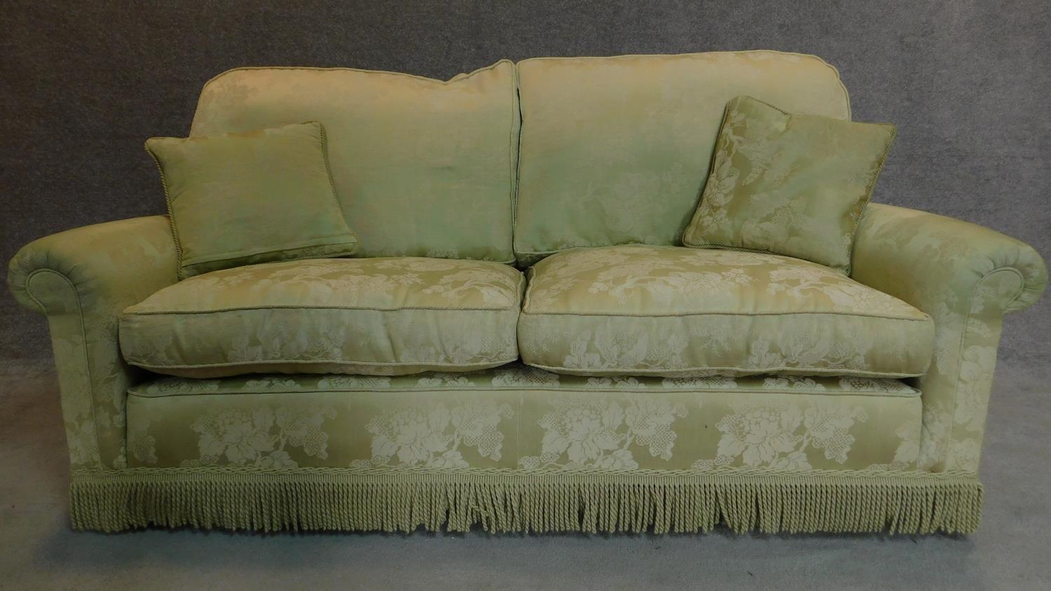 A two seater sofa in floral green upholstery. 77x188x85cm - Image 2 of 4