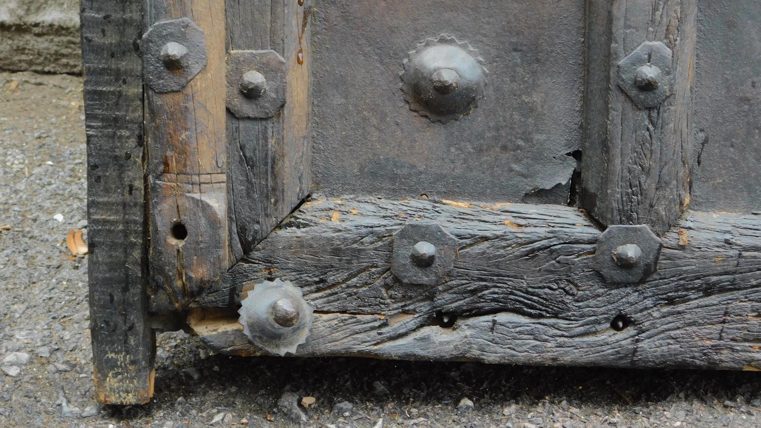 An Antique carved, panelled and studded door from the Kafiristan region of Afghanistan. 217x58cm - Image 3 of 6