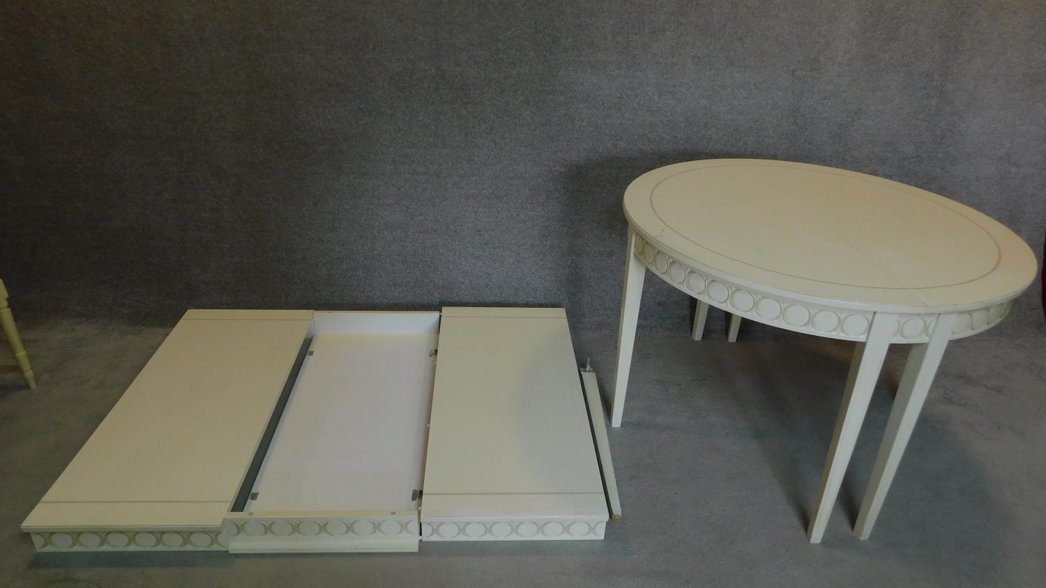 A white painted and decorated Georgian style extending dining table with three extra leaves, - Image 5 of 7