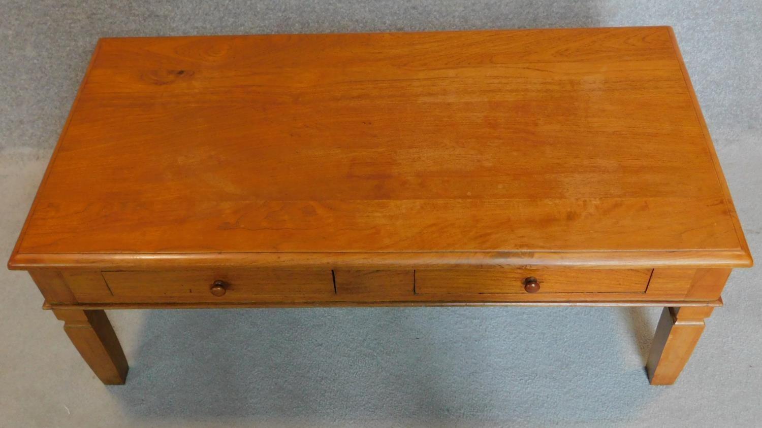 An Eastern teak low table fitted frieze drawers. 46x124x63cm - Image 5 of 5