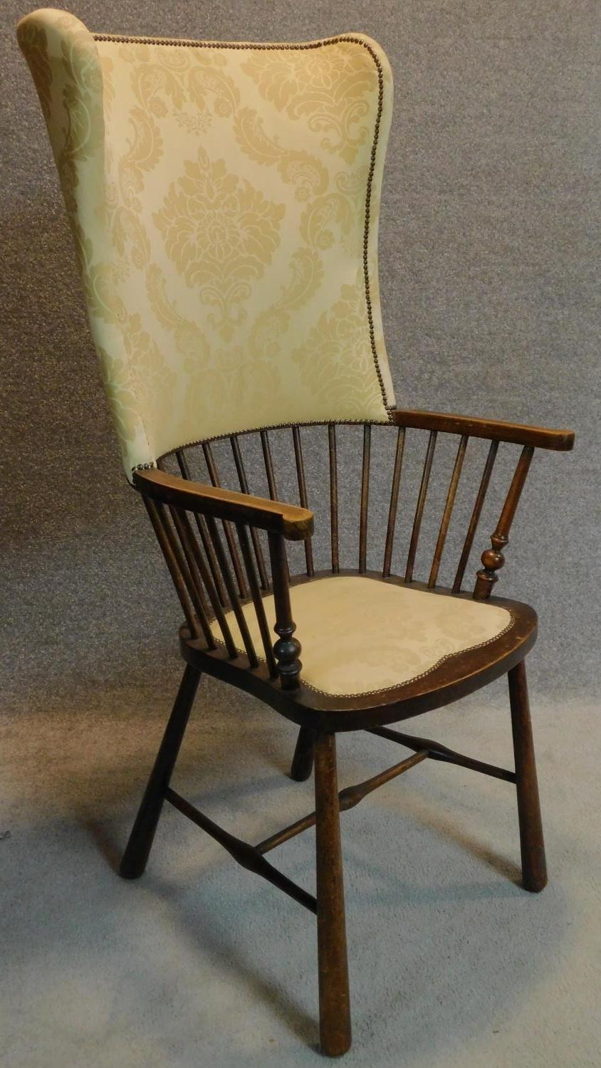 A late 19th century Arts and Crafts Shoolbred armchair, label to base. H.123cm