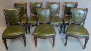 A set of seven late Victorian carved mahogany dining chairs in the Gillow's manner upholstered in