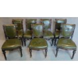 A set of seven late Victorian carved mahogany dining chairs in the Gillow's manner upholstered in