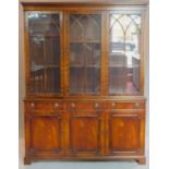 A Georgian style mahogany two section library bookcase, makers label. 195x150x40cm