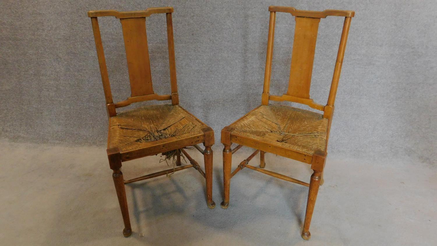 A pair of late 19th century oak side chairs. H.94cm