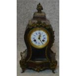 A 19th century boulle work mantel clock. H.30cm (lacking pendulum and some brass inlay)
