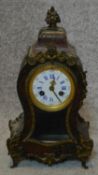 A 19th century boulle work mantel clock. H.30cm (lacking pendulum and some brass inlay)