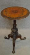 A Victorian burr walnut and inlaid circular tripod table. 73x50x50cm