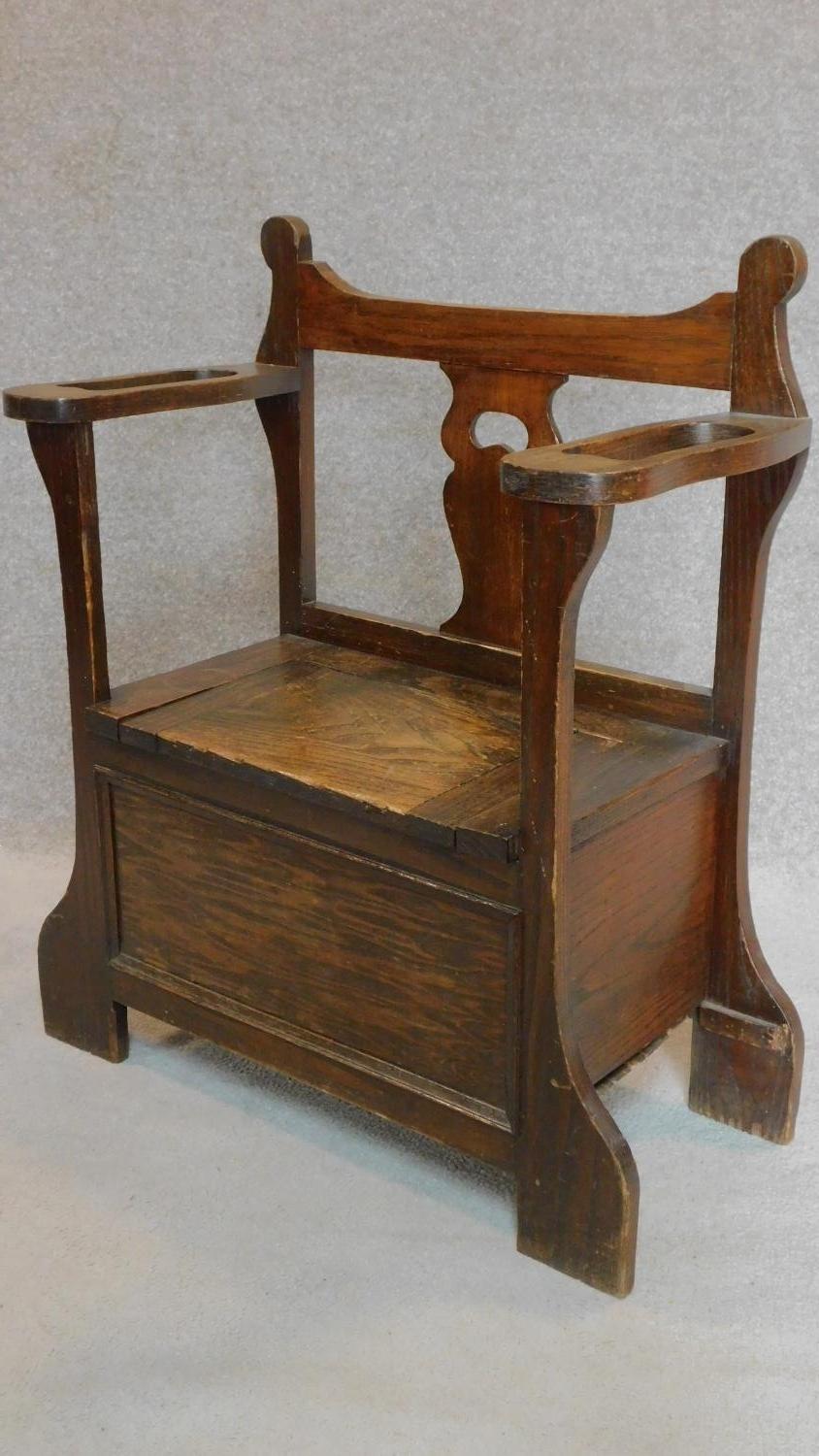 An oak hall settle/umbrella stand with lift up seat. H.86cm - Image 2 of 4