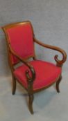 A 19th century mahogany Empire style armchair on cabriole supports. H.92cm