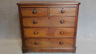 A Victorian mahogany chest of two short over three long drawers on plinth base. 109x122x53cm