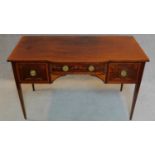 A late Victorian mahogany and well inlaid writing table on square tapering supports. 74x122x60cm
