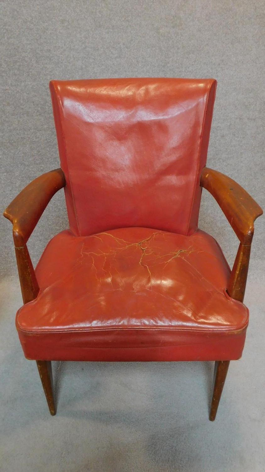 A pair of mid century teak red leather upholstered desk chairs. H.85cm - Image 2 of 6