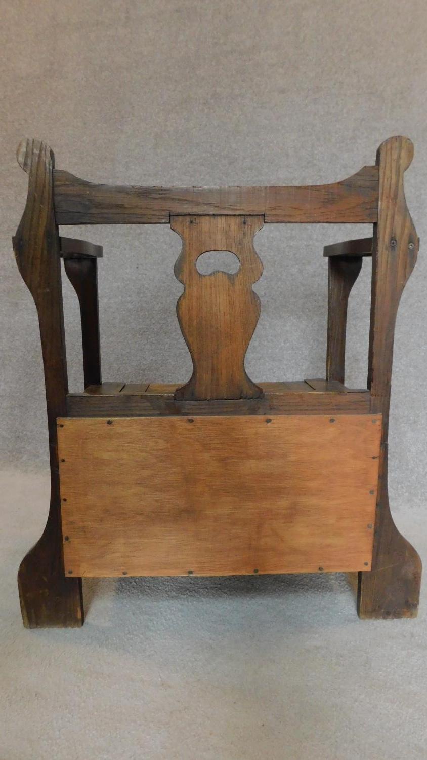 An oak hall settle/umbrella stand with lift up seat. H.86cm - Image 4 of 4